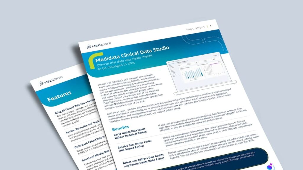 Healthcare IT professional at desk managing patient data